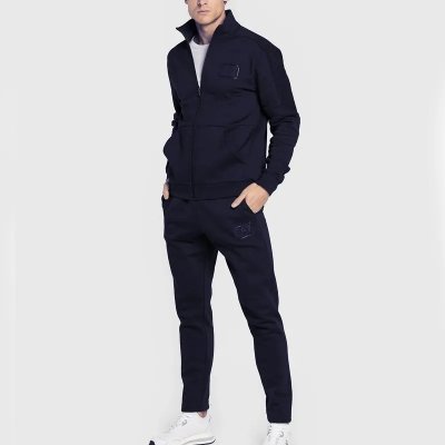 Komplet dresowy Emporio Armani EA7 bawełniany męski spodnie bluza ze stójką granatowy